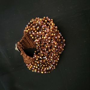 Avon crocheted and small beaded bracelet